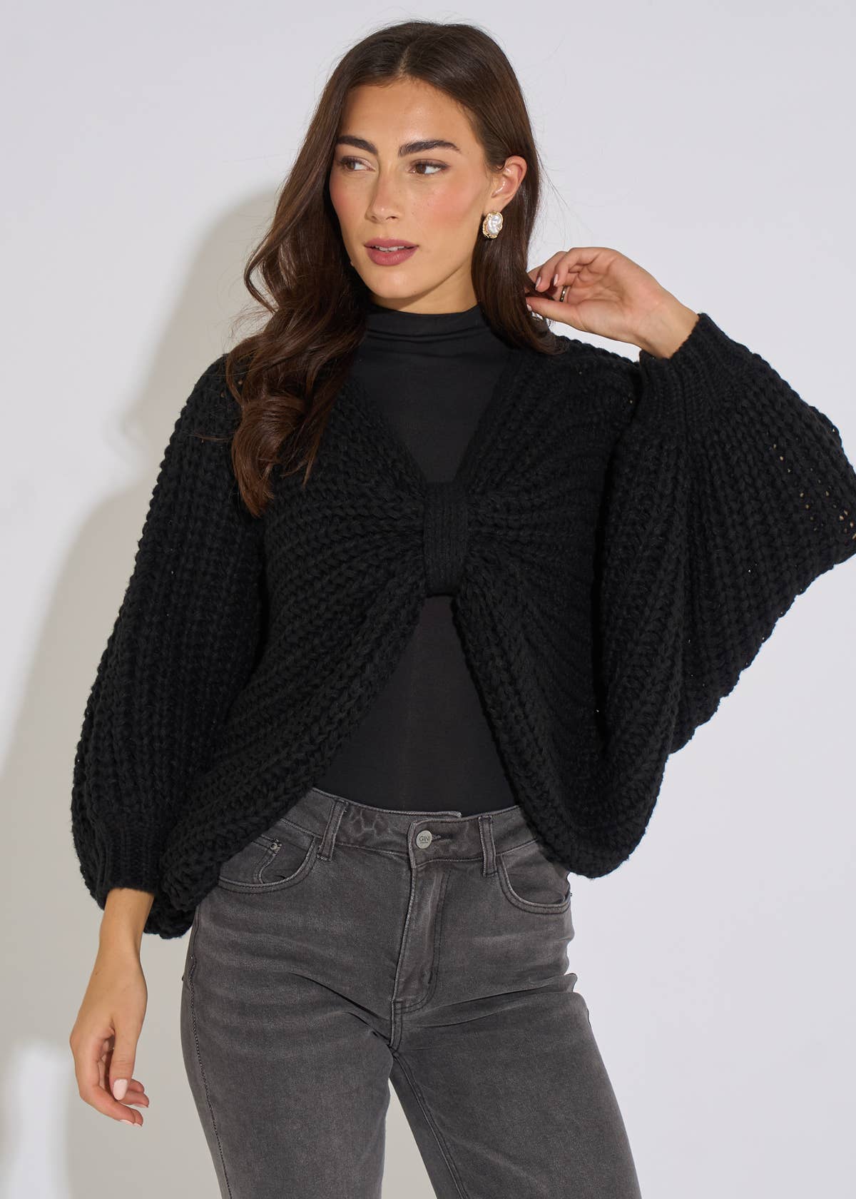 Black Oversized Bow Multi Way Wear Knit Jumper– View 1 | Gini London