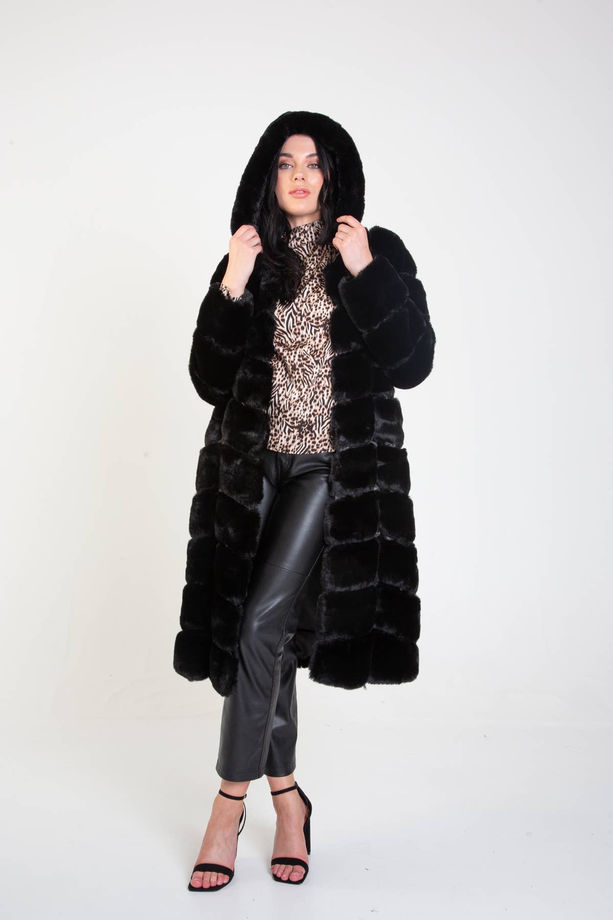 Black Panelled Hooded Longline Fur Coat – View 1 | Gini London